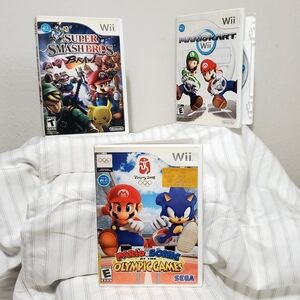 Wii Games: Super Smash Bros Brawl. Mariokart. Mario & Sonic At The Olympic Games